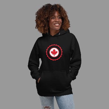 Person wearing a black hoodie with a red and white logo on a white background  - Canada Maple Leaf