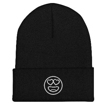 Black beanie with a white emoji design on a white background