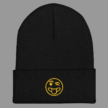 Black beanie with a yellow smiley face design on a white background