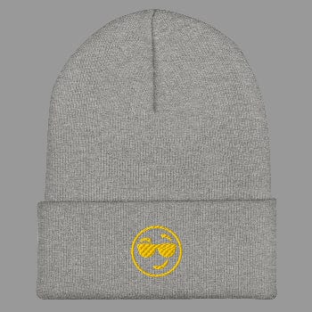 Gray beanie with a yellow smiley face design on a white background
