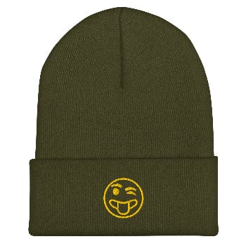 Green beanie with a yellow smiley face emblem on a white background