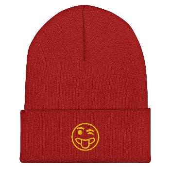 Red beanie with a yellow smiley face design on a white background