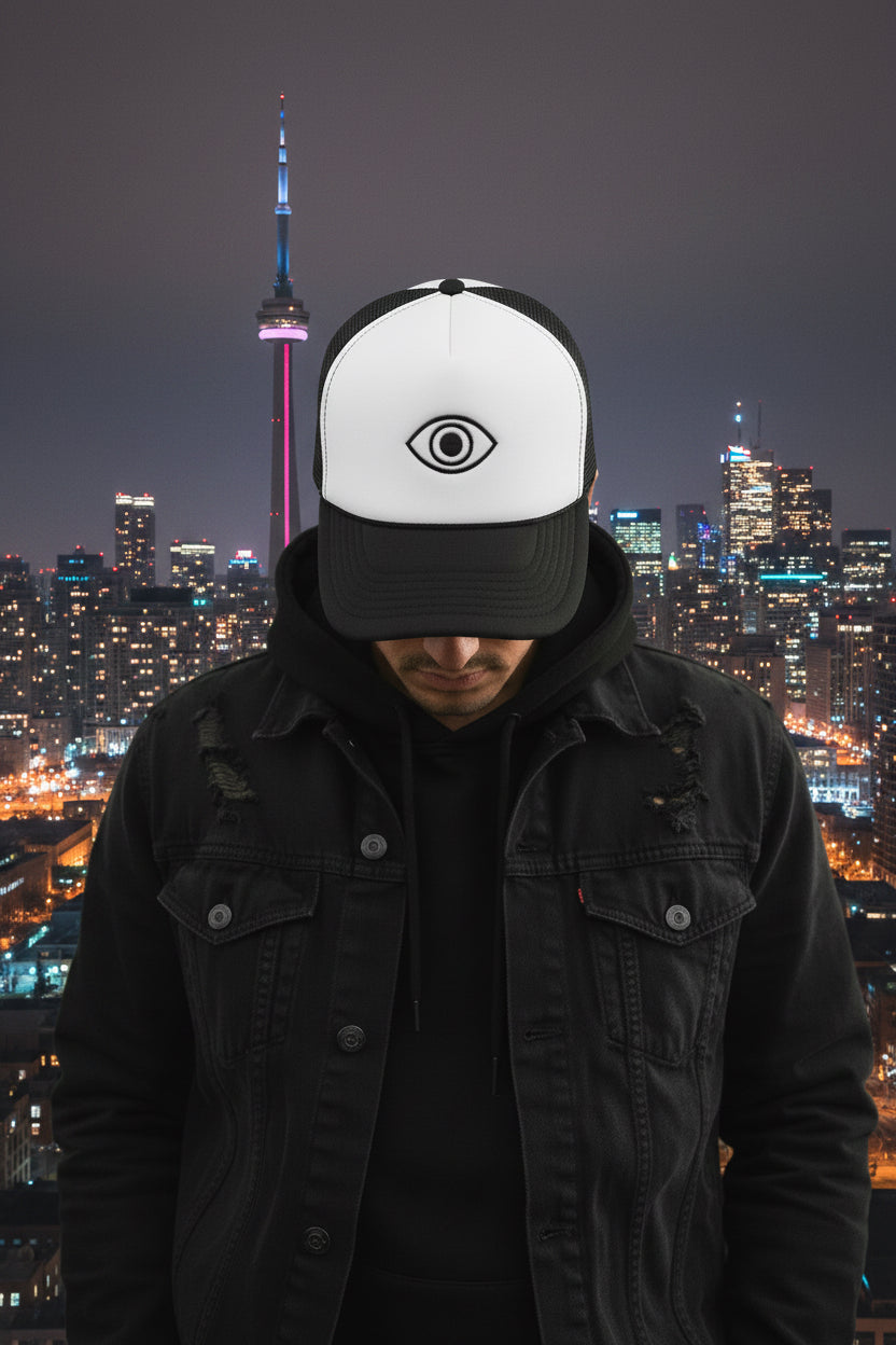Signature Foam Trucker Hat with stylized eye design front view