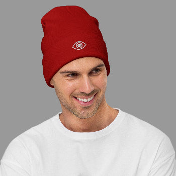 Man wearing a red beanie with a eye logo on a white background