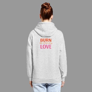 Person wearing a gray hoodie with 'BURN for what you LOVE' text on the back against a white background