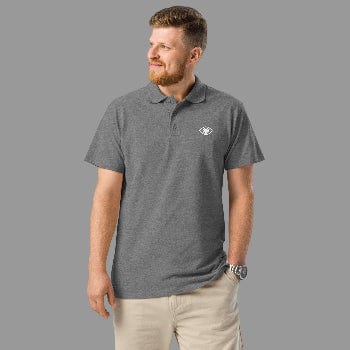 Man wearing a gray polo shirt with an eye logo on a white background